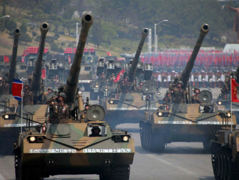 North Korean artillery on parade. It isn't their nukes we should be worried about, but rather their divisive diplomatic policy, designed to frighten the United States and South Korea apart. Once separated, the South becomes vulnerable, and the North strikes.