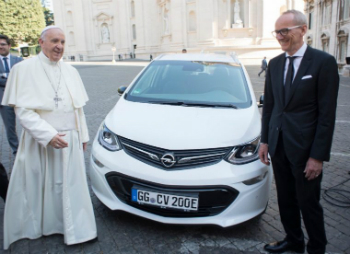 Pope Francis with his new car. The car is part of the plan to make the Vatican the first carbon neutral state.