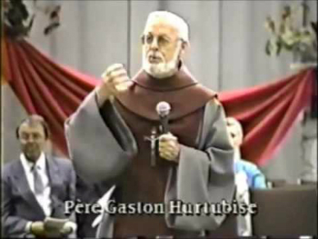 Father Gaston Hurtubise preaching his last sermon.