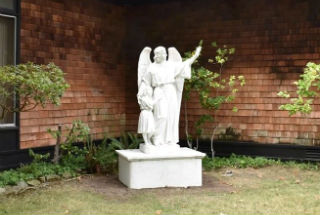 One of the 18 remaining statues at the school.