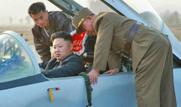 Kim Jong Un sits in the cockpit of a MiG 29 'Fulcrum' fighter.
