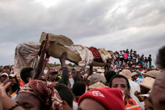 Health officials have blamed ceremonies that involve digging up the dead and reburying them for the current outbreak, but this has not been confirmed. Still, they have asked people to halt the practice.