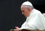 Image of Pope Francis prays for victims. 