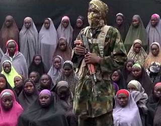 Nigerian president [not [pictrued] promises quiet action against Boko Haram.