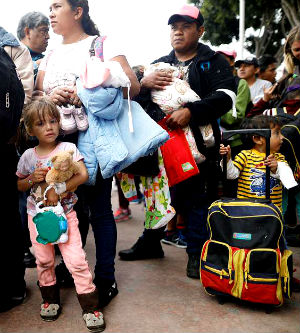 Many from the caravan fleeing violence were traveling with young children.