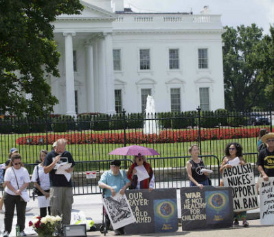 Facing the Pentagon, we held signs calling for an end to all nuclear weapons.