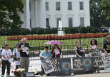 Image of Facing the Pentagon, we held signs calling for an end to all nuclear weapons. 