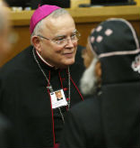 Image of Archbishop Charles Chaput speaks at Synod of Bishops.