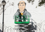 Image of he mural, of St. Thomas Aquinas surrounded by Houston landmarks, will be located on the side of Crooker Center.