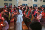 Image of Faithful praying with Pope Francis in Miao diocese for persecuted Christians in Middle East