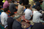 Image of Uyghurs at a mosque in Kashgar Xinjiang China