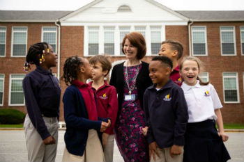 Principal Claire Dant with students at Bethel Christian Academy in Savage Maryland
