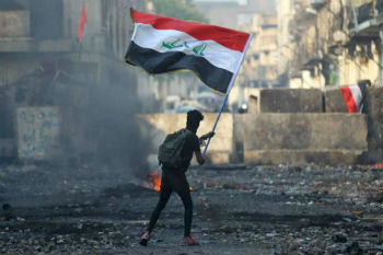 Image of Iraqis protesting in the streets of Baghdad