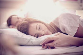 Image of Couple with phones