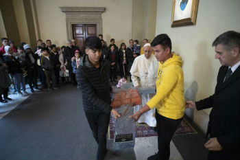 Image of Pope Francis installed inside the Vatican palace a cross with a life jacket molded to it Dec 19 2019