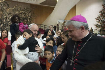 Image of Pope Francis with children of the Santa Marta Dispensary