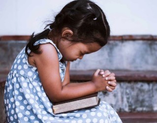 Image of Praying is a way for kids to communicate with our savior. 