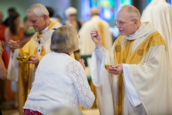 Image of Several diocese are issuing new guidelines for Communion and other practices to prevent the spread of germs. 