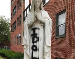 Image of An statue of Mary was spray painted outside Cathedral Prep School and Seminary, Queens, New York. (Photo by: Diocese of Brooklyn)