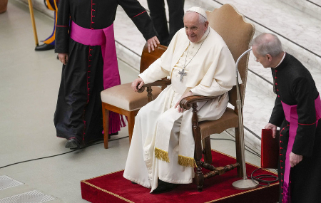 Image of The Holy Father remained seated during several recent public appearances where he would normally stand. 