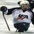 Image of PARALYMPIAN COMPETES – Chris Manns, a member of the U.S. Paralympics sled hockey team, is pictured during a game in early February against Germany in the USA Cup in Colorado Springs, Colo. Manns, 25, was named to his second sled hockey team, which was competing in this year's Paralympic Games March 10-19 in Turin, Italy. (Colorado Catholic Herald photo) 
