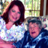 Image of Catholic Community Hospice caregiver Julie Horton and patient Jane Hayes share a smile during a recent visit. (The Catholic Key photo)
