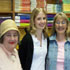 Image of The 2006 Bishop Dwenger valedictorian Claire Ensley, center, stands with her grandmother, Mary Stout Carroll, left, and mother, Susan Ensley, in Susan’s first-grade classroom at St. Charles School where they are all members of the parish. Claire is the most recent generation of her family to earn valedictorian status. Carroll was valedictorian of Elmhurst class of 1947. Susan Ensley earned top rank at Dwenger in 1981. (Today's Catholic photo)
