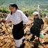 Image of PILGRIMS CLIMB HILL IN MEDJUGORJE – Pilgrims in June 2004 climb the hill where apparitions are said to have first occurred in 1981 in Medjugorje, Bosnia-Herzegovina. Franciscan pastors in the village of Medjugorje are preparing for overflow crowds to arrive on the 25th anniversary of six children reporting apparitions of Mary. (CNS/Reuters)
