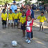 Image of THE DON BOSCO WORLD CUP First Lady Kirsty Sword prepares to kick the first soccer ball to begin the 
