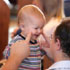 Image of PARENTS PRESENT FOR CHILD’S BAPTISM – Deacon George Reich baptizes Christopher Jack Guarnieri in the presence of parents Patricia and Thomas Guarnieri at St. John Nepomucene Church in Bohemia, N.Y., in 2004. Parents seeking authentically teach the faith to their children can look to the Ten Commandments as a place to help them help their children grow as healthy Christian men and women. (CNS/The Long Island Catholic) 

