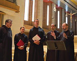 Image of MONKS SING DURING PRACTICE SESSION AT KANSAS MONASTERY
The monastic schola, or core choir, of St. Benedict's Abbey in Atchison, Kan., has recorded a new CD, called 