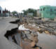 Image of Utility workers repair downed power lines on a flood-damaged road in Villahermosa, Mexico, Nov. 9. Flood evacuees now face the challenge of rebuilding their lives in the face of many obstacles. (CNS photo/Ioan Grillo) (Nov. 12, 2007)