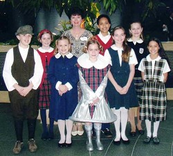 Image of A UNIFORM LOOK - Catholic school uniforms at many schools have changed over the years, but they remain popular with parents as a way to reduce competition among their children and schoolmates over clothing styles and brands.  