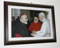 Image of The wife and a daughter of one of the three men killed when gunmen kidnapped Chaldean Catholic Archbishop Paulos Faraj Rahho cry during his funeral in Mosul, Iraq, March 1, 2008. Gunmen kidnapped the archbishop Friday killing three people who were with him. Pope Benedict XVI appealed for the cleric's swift release.
