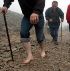 Image of CLIMBING CROAGH - A man made a barefoot ascent of Croagh Patrick to mark St. Patrick's 5th-century fast on the mountain's summit. (Haydn West)