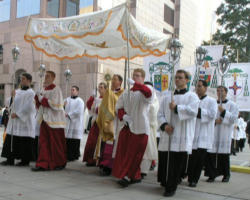 Image of Pope Benedict XVI, like his beloved predecessor, the Servant of God John Paul II, has strongly encouraged devotion to the most Holy Eucharist. He has also, through his encyclical letters, connected that devotion to the way we are called to live a life of love.
