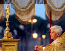 Image of After having received the Body, Blood, Soul and Divinity of Jesus Christ in Holy Communion, Catholic Christians proceed from the Sanctuary into the Streets of the world, pausing along the way for solemn worship, songs of adoration, and holding the Lord aloft, enthroned. The procession symbolizes the ongoing redemptive mission of Jesus Christ to the world as it is now lived out through his Church.