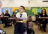 Image of Catholic School children rejoice over winning an academic achievement award 