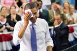 Image of Obama wipes the sweat from his brow following his campaigns speech in which he advocated abortion and homosexual equivalency at a high school then invoked the blessings of God.  