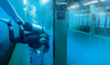 Image of A diver plumbs the depths of a flooded subway station. 