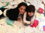 Image of Gabrielle Miller with her mother. Gabrielle wished for more wishes and got 36 more for other kids. 