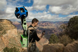 Image of A hiker captures panoramic images of the Grand Canyon for Google. 