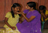 Image of Mother showing compassion to her daughter