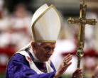 Image of Pope Benedict XVI waving to participants at his final public mass. 