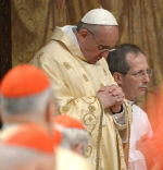 Image of Holy Father Francis at his first public Mass.