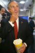 Image of Kids can't read, you can't have a soda, and you'd better turn that music down, but Mayor Bloomberg has his popcorn. 