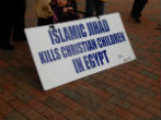 Image of Copts in the USA protest the violence their families face in Egypt. 