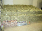 Image of A record $207 million seized in 2007, the world's largest drug cash seizure in history. The seizure was part of an anti-meth operation. It's also a very tiny fraction of the multi-billion dollar industry --enough to make the innocent think governments are doing something to fight, rather than aid the problem. 