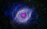 Image of Smaller stars than the one just discovered are forming in the more picturesque Helix nebula. From these clouds of dust and gas, created by the explosions of larger stars, new stars form attended by heavy elements, planets, and possibly life.