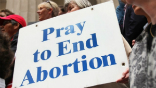 Image of A pro-life advocate at the capital in Austin.
